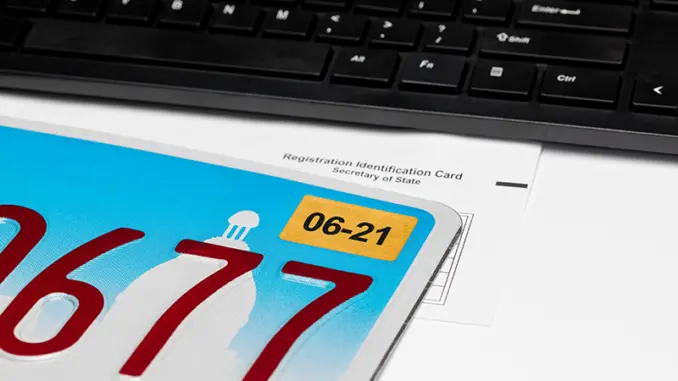 Vehicle license plate, renewal sticker, computer keyboard and re จองทะเบียนรถออนไลน์